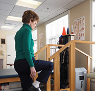 old woman doing physical therapy