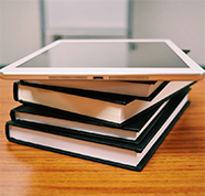 ipad on top of books