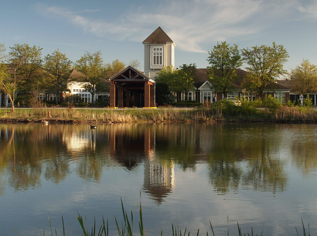 Kendal at Oberlin tower entrance - reflects in pond