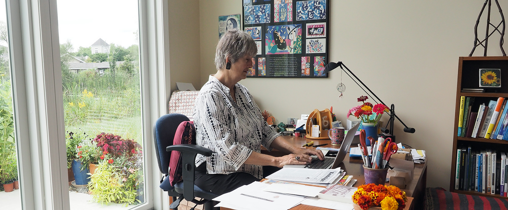 Resident at her desk with computer