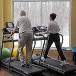 older people exercising on treadmill