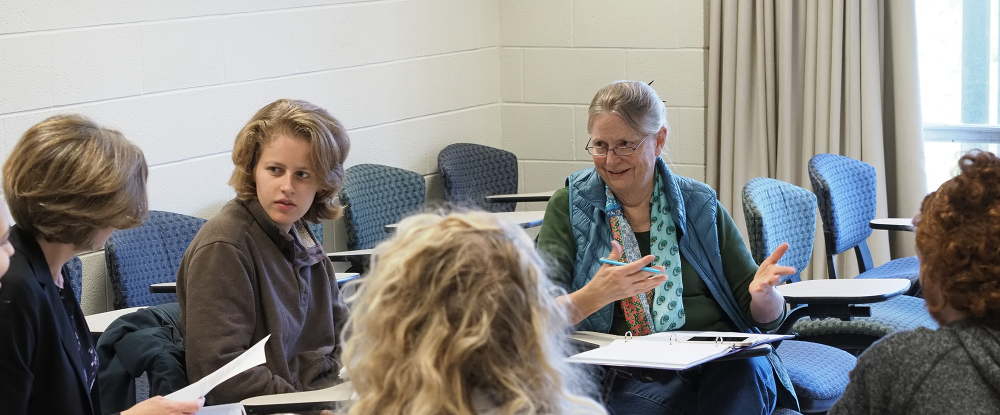 older woman auditing college class