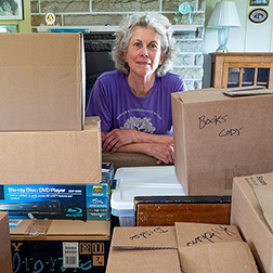 woman with moving boxes