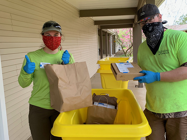staff masked - delivering pizza