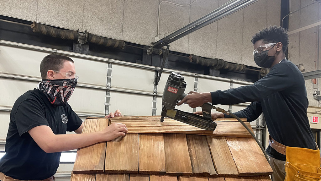 JVS students build mud kitchen