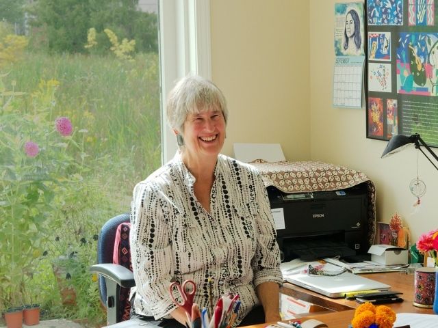 Tina at desk