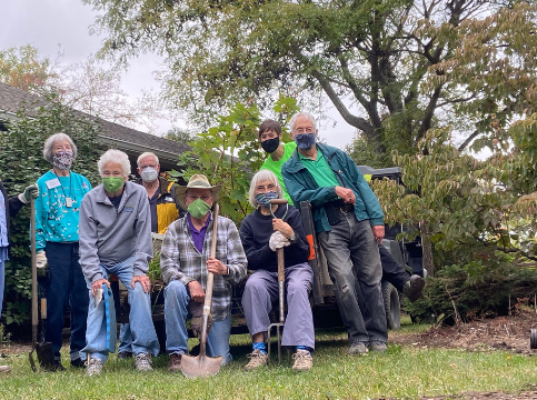 group of masked residents and staff gardeners