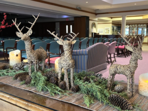 three decorative deer