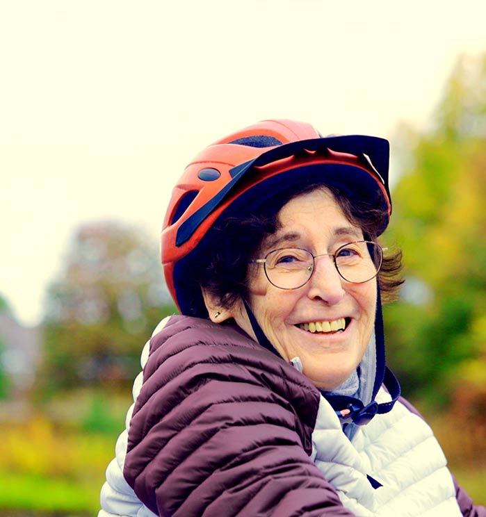 older woman bicycle helmet - Kendal at Oberlin
