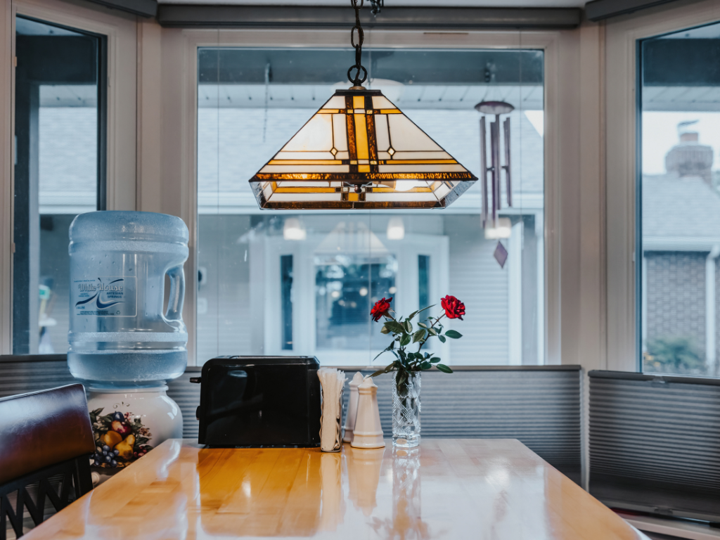 kitchen island with flowers in vase on top