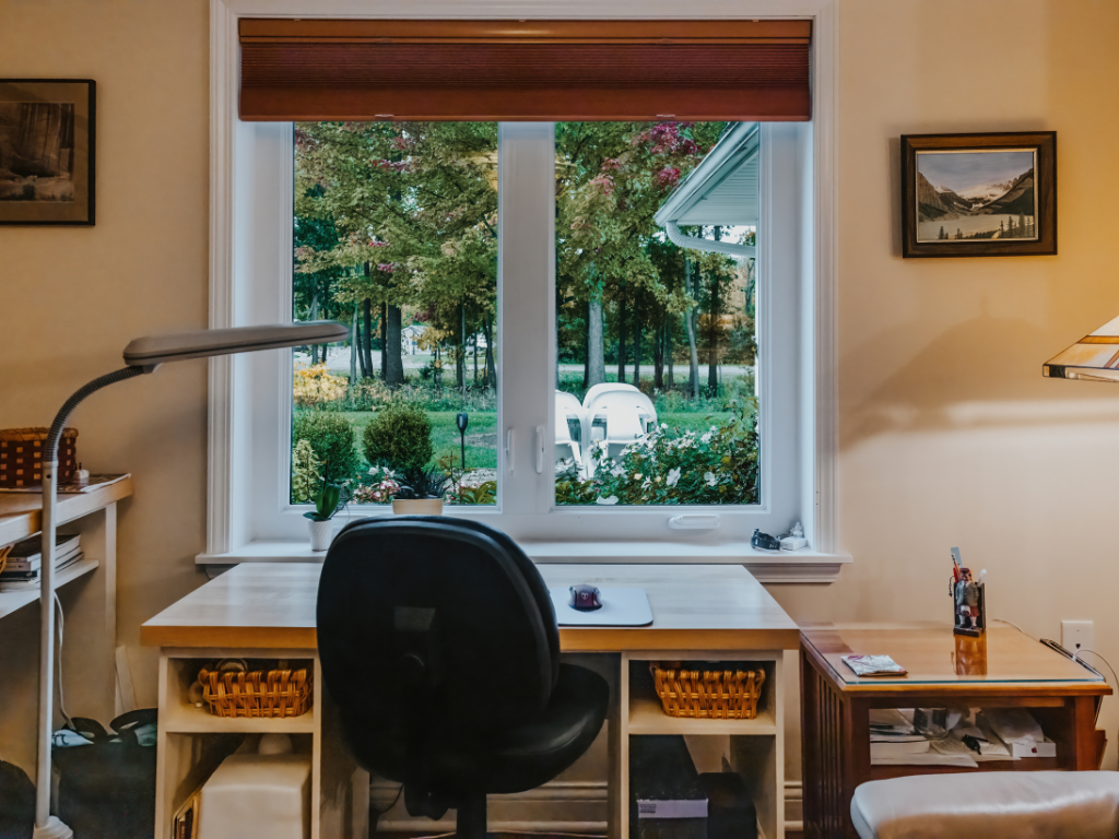 desk, chair, lamp and window 