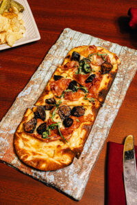 flatbread pizza on tray