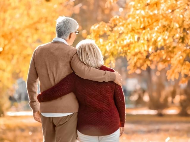 older couple side hugging