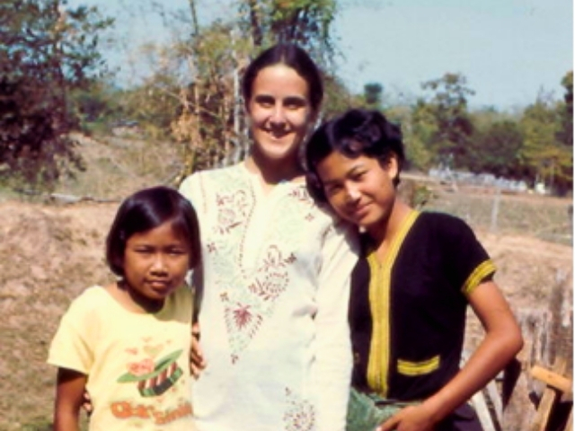 Rebecca with children in Thailand